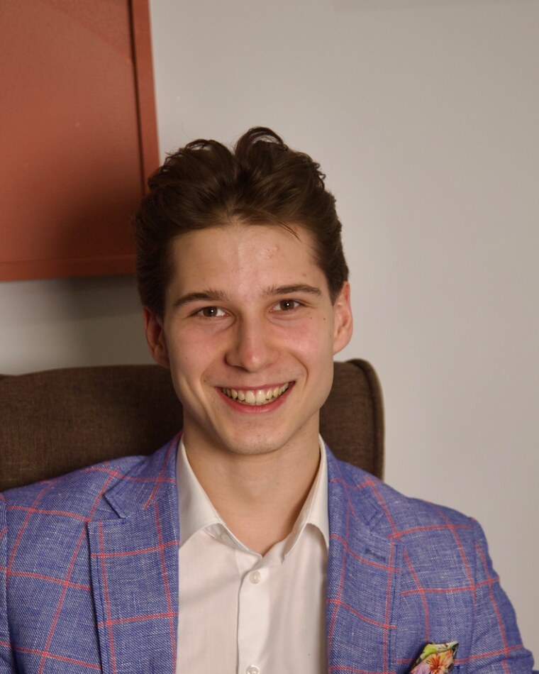 Mike Gavrilov in a blue checked blazer
